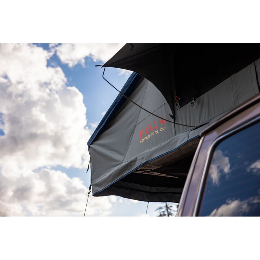 Roam Vagabond XL Rooftop Tent looking up at the clouds