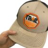 Trail Industries two tone tan & brown patch hat close up
